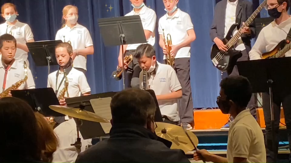 Calvin performing with a youth ensemble